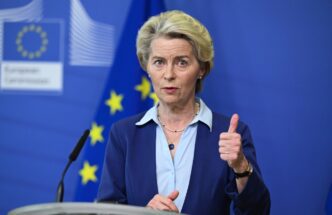 European Commission President Ursula von der Leyen giving a thumbs-up during a press conference
