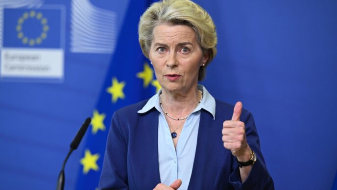 European Commission President Ursula von der Leyen giving a thumbs-up during a press conference