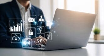 Businessman working on a laptop in a modern office, with productivity and connectivity icons overlaid.