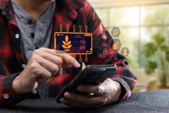 A person uses a mobile application to monitor and manage a smart farming system with various sensors and data visualizations.