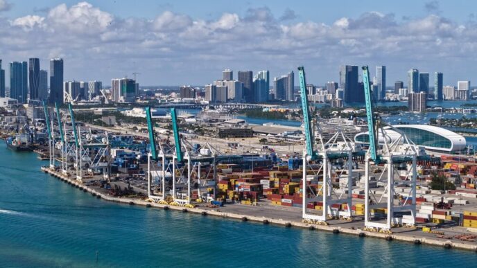 Aerial view of the Port of Miami, showing cargo containers and industrial infrastructure for import and export services.