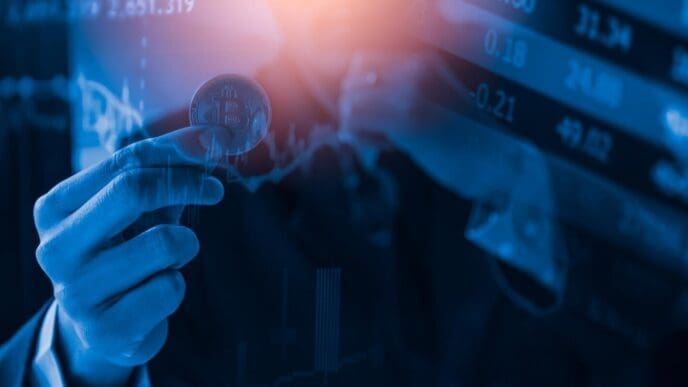 A person uses a smartphone to make a Bitcoin payment, illustrating a convenient modern transaction in the global economy.