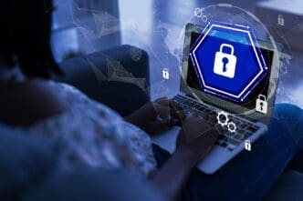 A laptop displays a secure login screen, illustrating cybersecurity in a contemporary office setting.