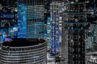 Blue-toned, single-color image of Yokohama's night cityscape.