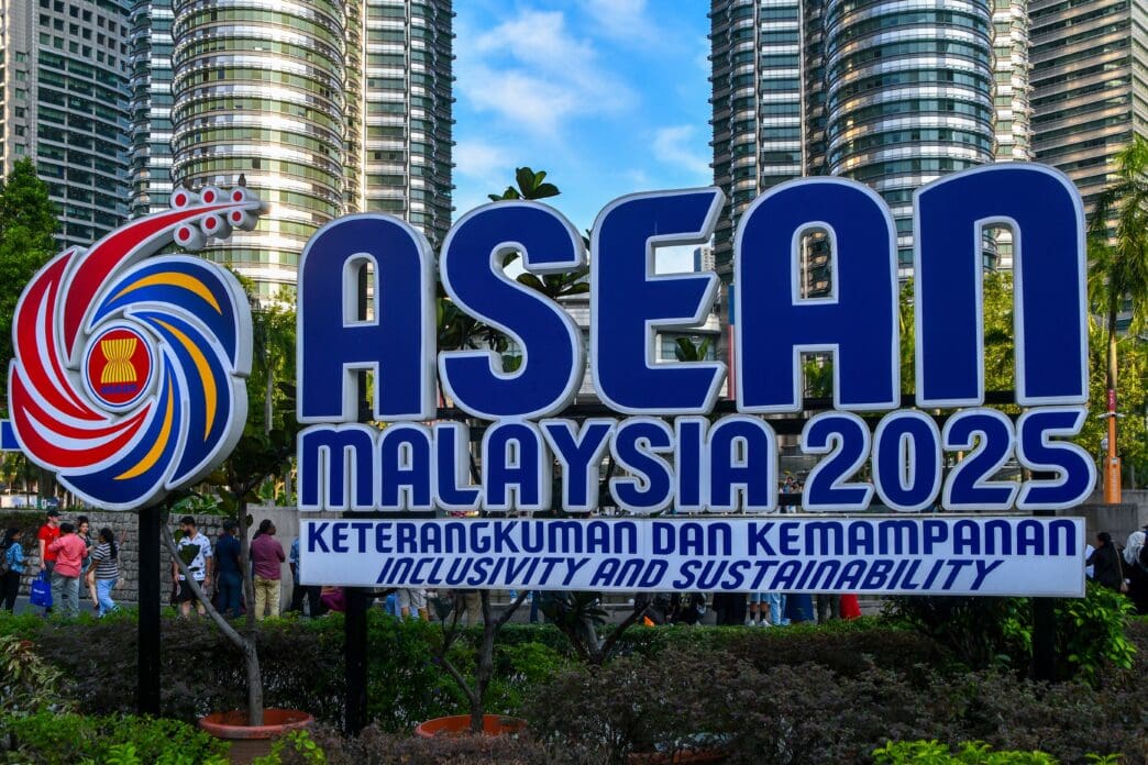 The large blue "ASEAN MALAYSIA 2025" sign with the Petronas Towers in the background.