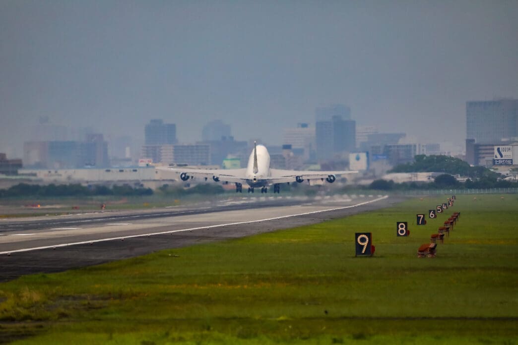 The rear view of Air Force One taking off from a runway in Osaka, Japan.