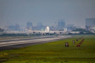 The rear view of Air Force One taking off from a runway in Osaka, Japan.