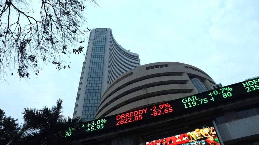 The Bombay Stock Exchange building in Mumbai, India, with a stock ticker.