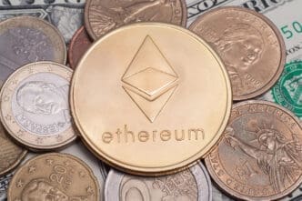 A gold Ethereum (ETH) coin is on top of US dollar and Euro coins and bills.