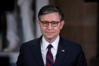 House Speaker Mike Johnson (R-LA) stands in National Statuary Hall at the U.S. Capitol.