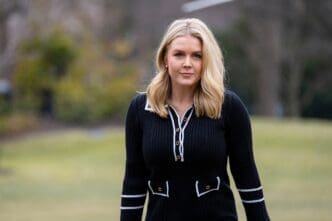 White House Press Secretary Karoline Leavitt walks on the White House South Lawn.