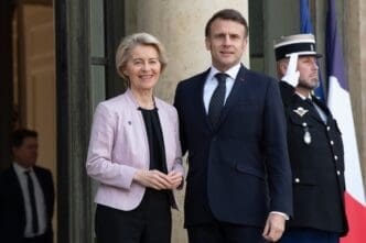 French President Emmanuel Macron and European Commission President Ursula von der Leyen stand together at the Élysée Palace.