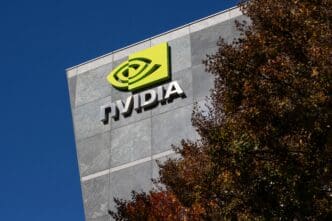 A low-angle shot of the Nvidia logo on the company's headquarters building in Santa Clara.
