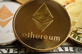 A close-up of a gold Ethereum coin resting on a US dollar bill next to other crypto coins.