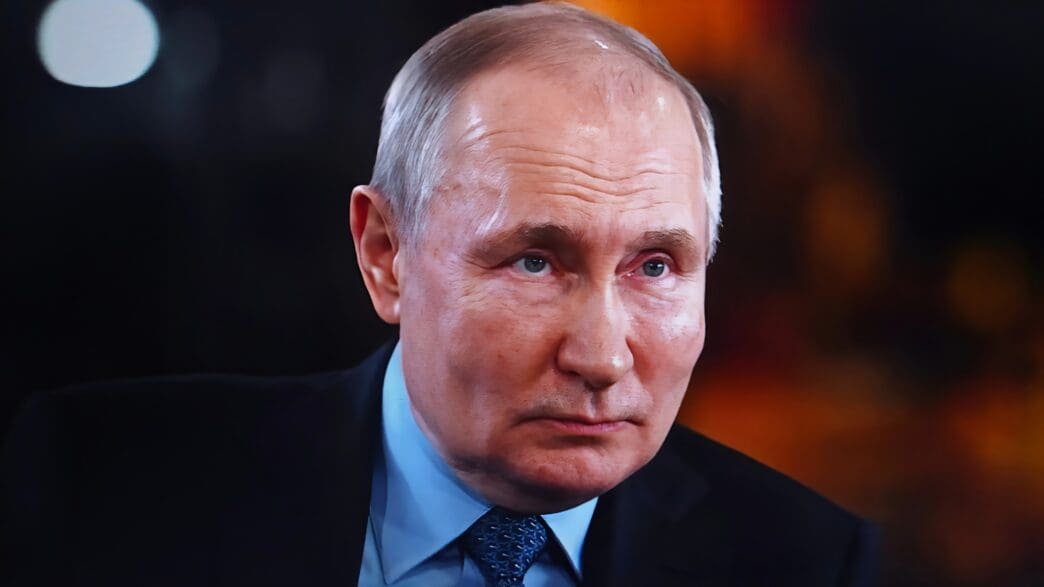 Close-up portrait of Vladimir Putin, President of Russia, looking sternly