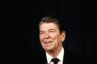 A portrait of President Ronald Reagan smiling in Washington, DC, on April 16, 1986.