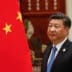 Chinese President Xi Jinping stands next to the flag of China during the G20 summit in Hangzhou.