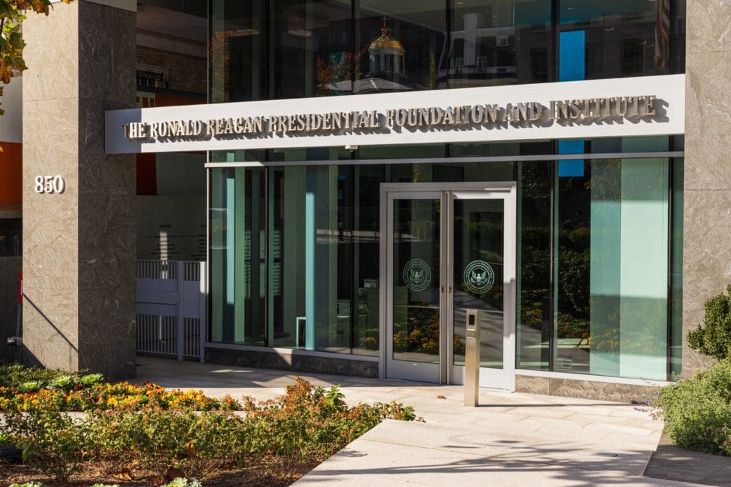 The modern glass entrance to the Ronald Reagan Presidential Foundation and Institute in Washington DC.