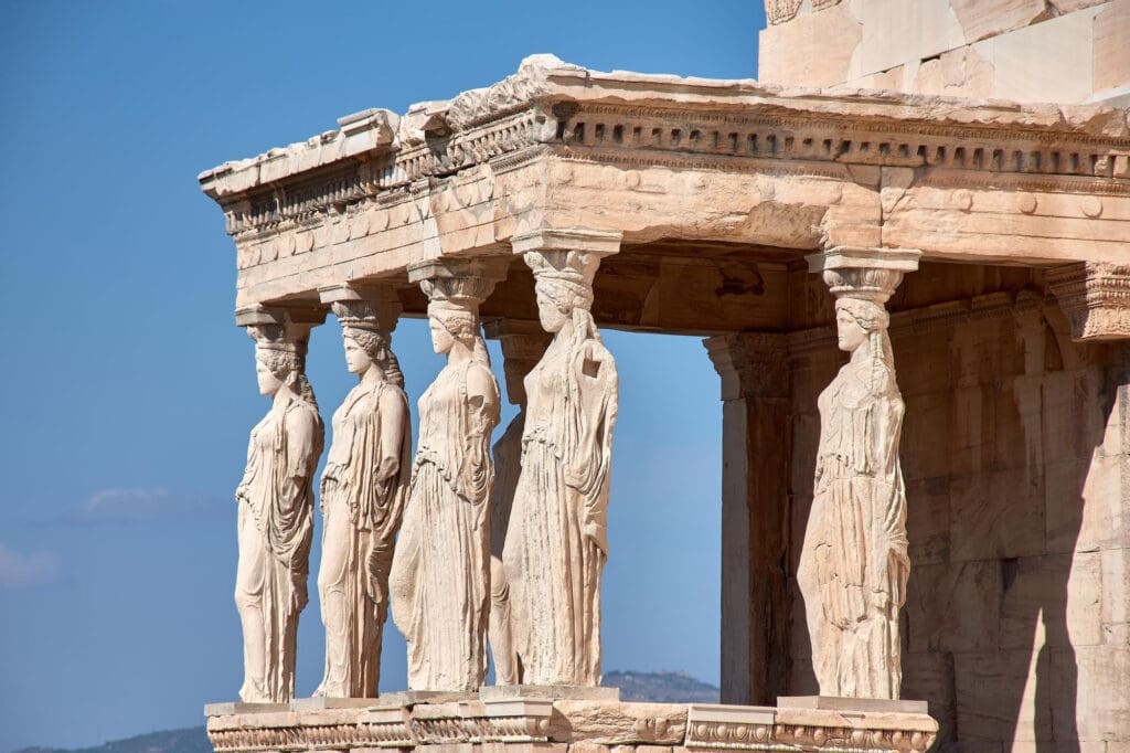 The famous Porch of the Caryatids at the Erechtheion temple, with its sculpted female figures used as columns.