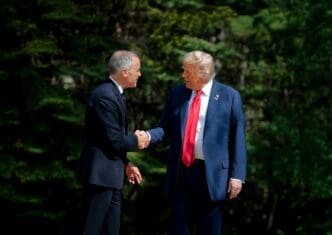 President Donald Trump shakes hands with Canadian PM Mark Carney at the G7 Summit.