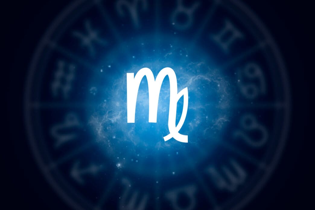 The zodiac symbol for Virgo is displayed prominently against a backdrop of a celestial nebula