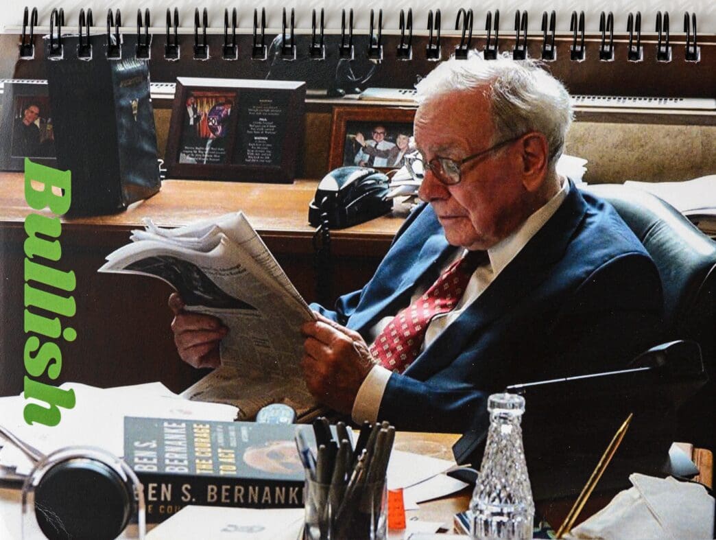 Investor Warren Buffett sits at his desk reading a newspaper in a photo on a spiral-bound book cover with the word 'Bullish'.