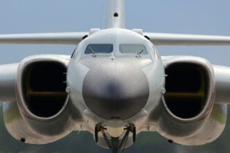A close-up front view of the Xian H-6K bomber, showing its cockpit and large engine intakes.