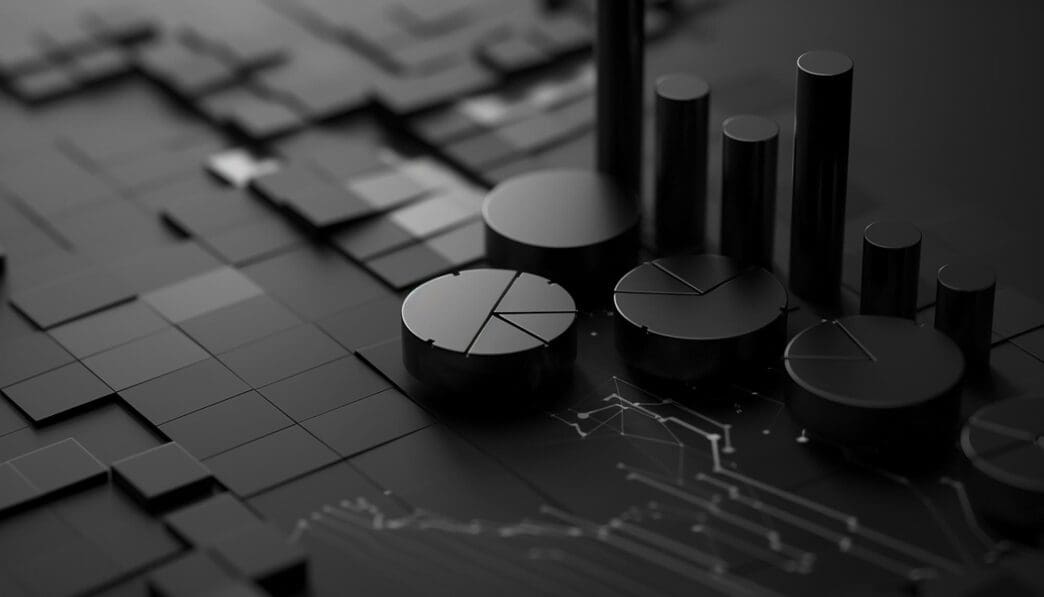 A black and white photo shows a computer screen with a circular object centered on it.