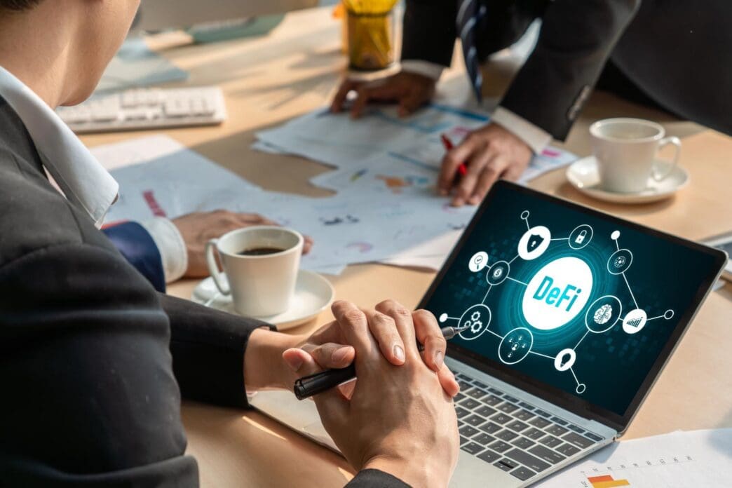 A modern computer screen displays the concept of decentralized finance, or DeFi.