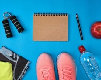 Objects arranged against a light blue background, seen from directly above.