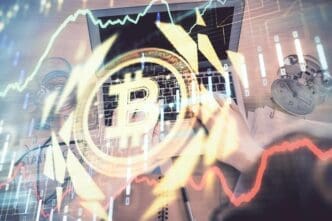 Double exposure of a person's hands typing on a keyboard with a cryptocurrency-themed hologram overlaid.
