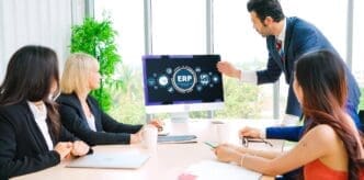 A graphic depicts a modern business environment with interconnected elements representing enterprise resource planning (ERP) software.