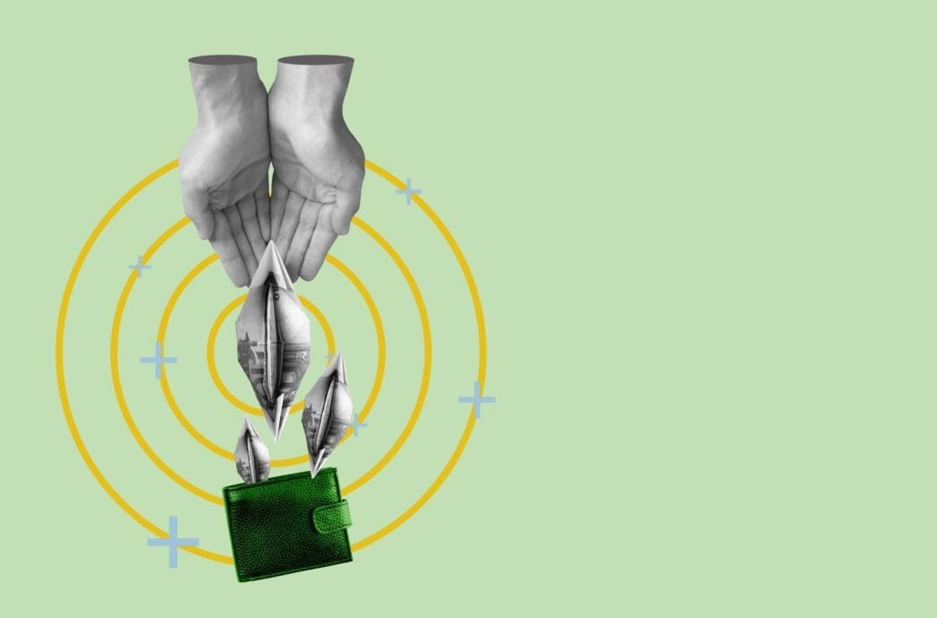Human hand reaching towards copy space on a finance and wealth banner.