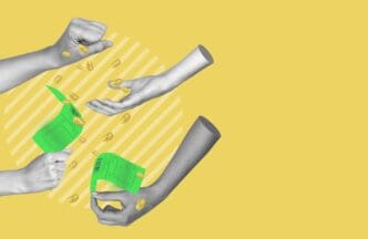 Human hand reaching towards copy space on a banner about finance and wealth.