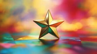 Shining gold star on a vibrant, colorful background, symbolizing success.