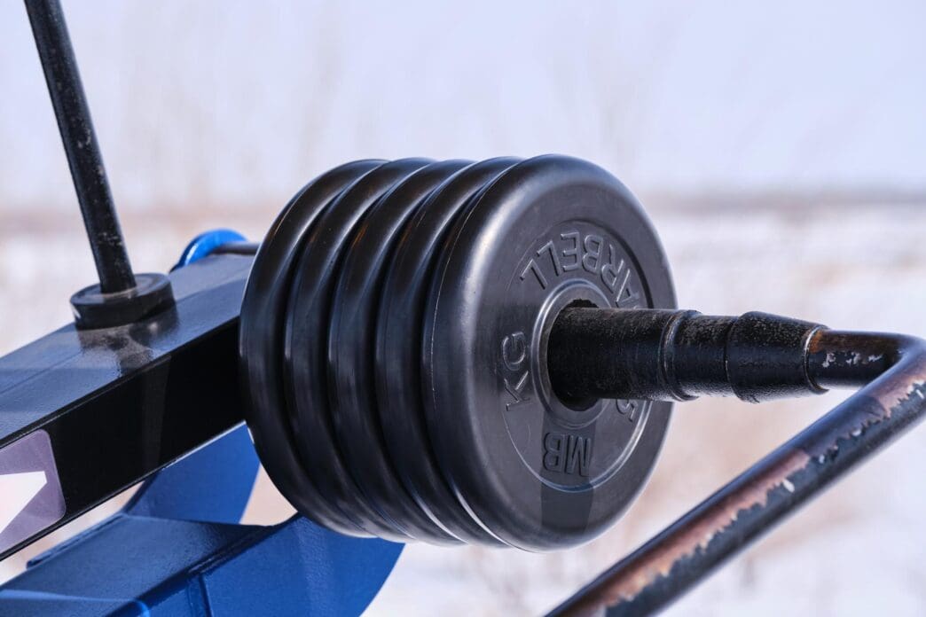 Pancakes are used as counterweights on a sports simulator.