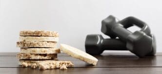 Close-up of rice and buckwheat cakes arranged on a wooden table.