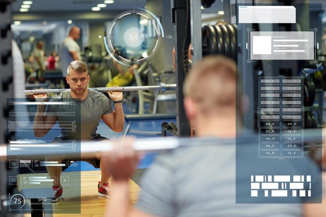 A young man flexes his muscles with a barbell in a gym, with virtual charts superimposed in the background.