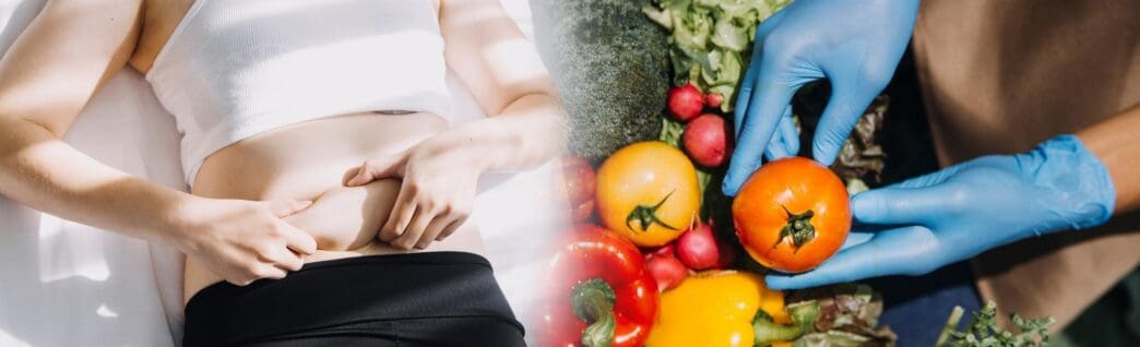 A young woman smiles while holding a variety of colorful fruits.