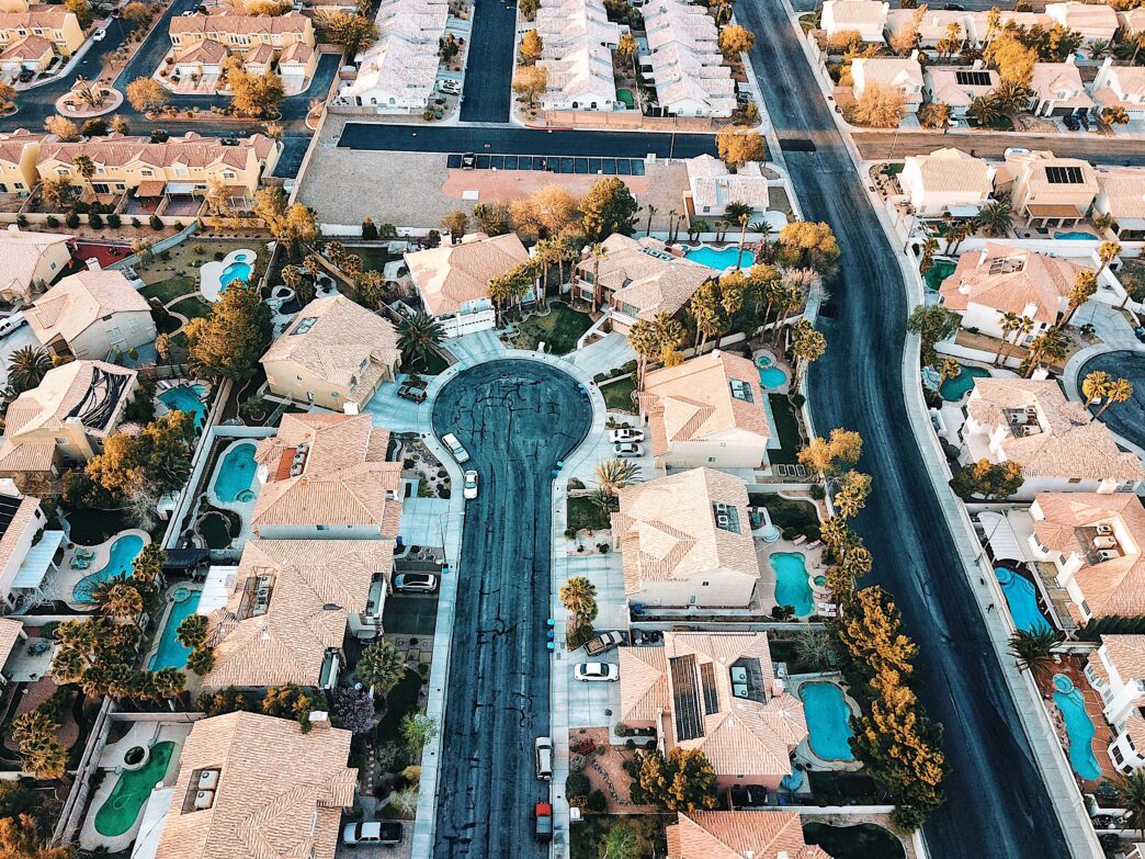Aerial view of closely packed houses in a residential town.