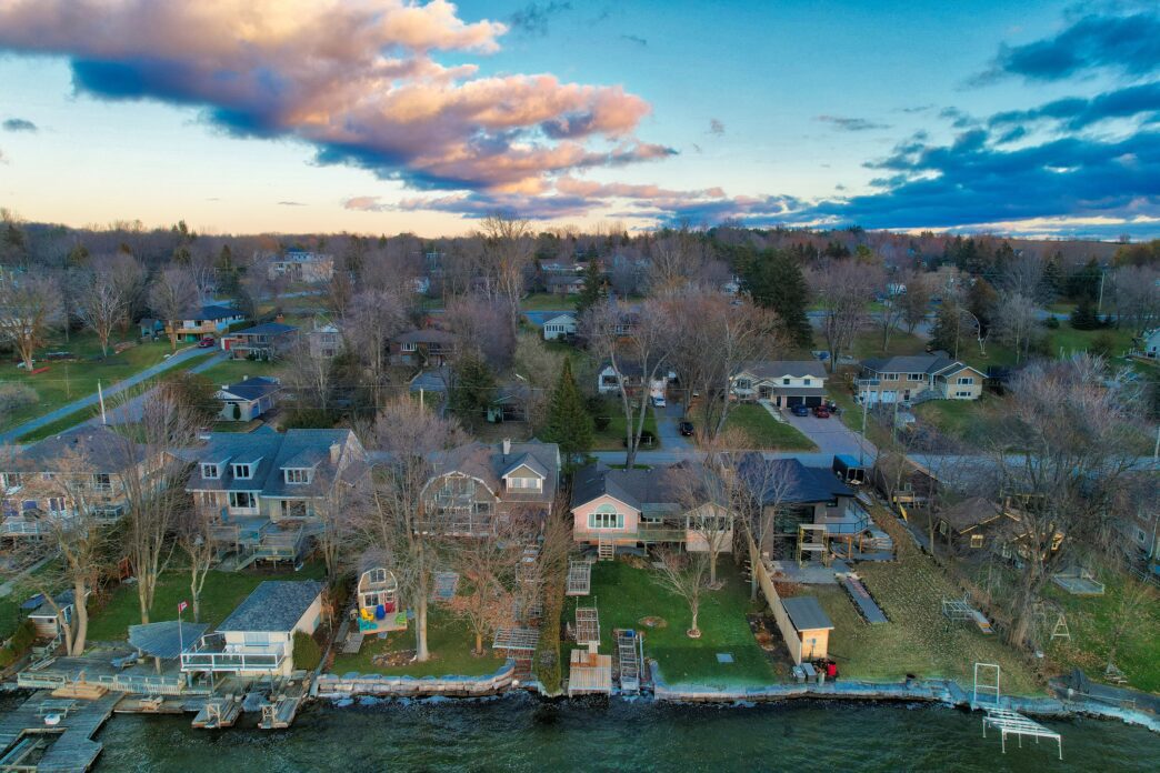 High-angle view of houses along a lake.