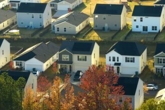 Aerial view of closely-spaced houses in a South Carolina residential area, illustrating a suburban housing development.