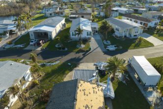 Aerial view of a residential area in Southwest Florida shows mobile homes severely damaged by Hurricane Ian.