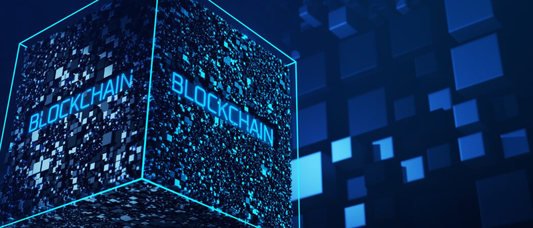 A glowing blue, interconnected cubic structure labeled "BLOCKCHAIN," representing decentralized technology.