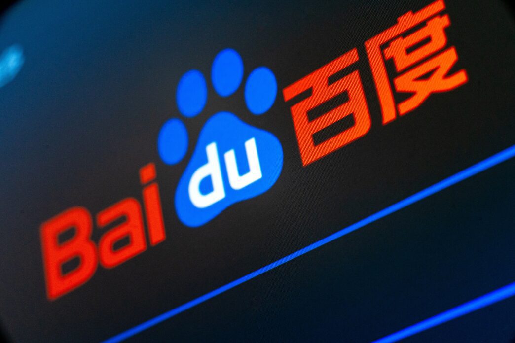 Close-up of a screen displaying the red Baidu logo and Chinese characters (Baidu 百度).