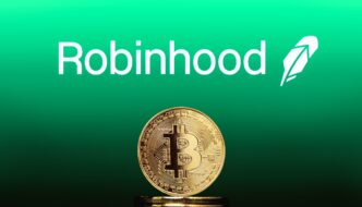 Gold Bitcoin coin in foreground with the white Robinhood logo on a green background.