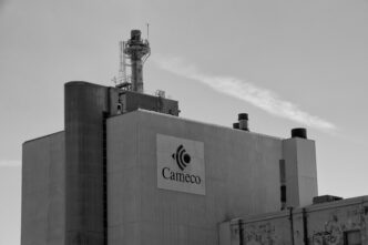 Black and white photo of the Cameco plant building with the logo clearly visible.