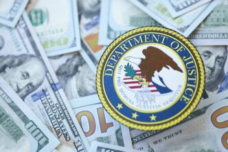 The seal of the US Department of Justice placed on a large, scattered pile of one-hundred dollar bills.