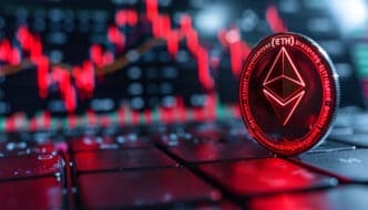 Ethereum coin with a red neon glow on a keyboard, set against a blurred red financial chart showing a decline.