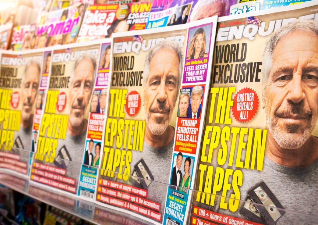 Multiple copies of the National Enquirer magazine cover featuring Jeffrey Epstein and headlines about his files.